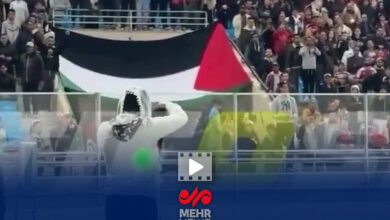 جیمی جامپ حامی فلسطین در جریان بازی فوتبال تونس و مالی